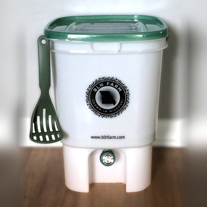 BLH Farm bokashi bin with green lid, masher and drain spigot