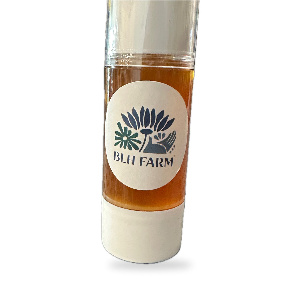 Close-up of amber Cordyceps Skin Serum and BLH Farm label