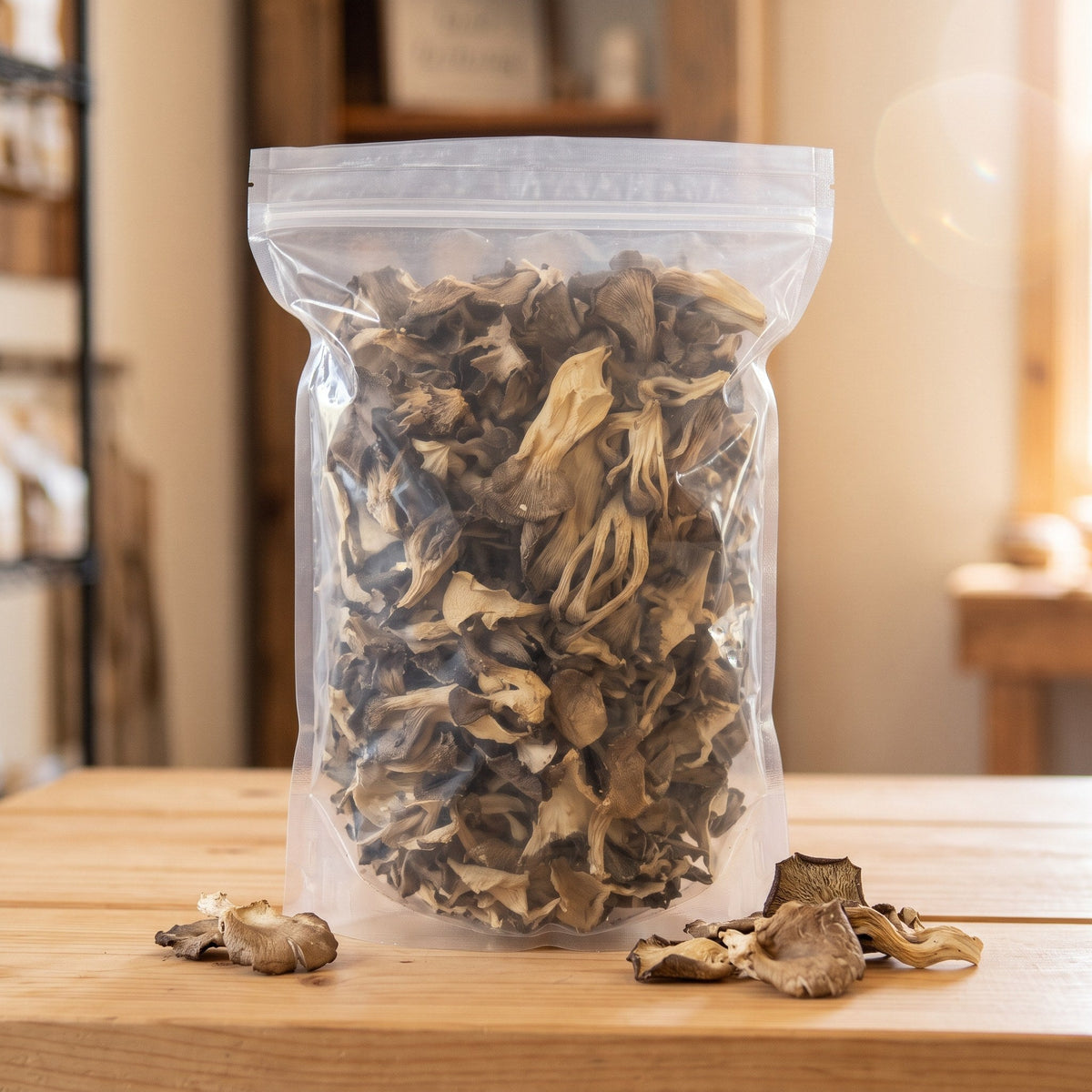 Clear bag of dried oyster mushrooms with a few mushrooms on the counter