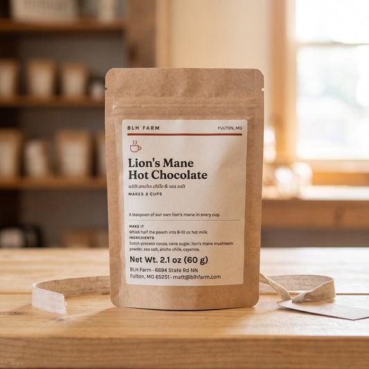 Lion's Mane Hot Chocolate gift pouch with a linen ribbon