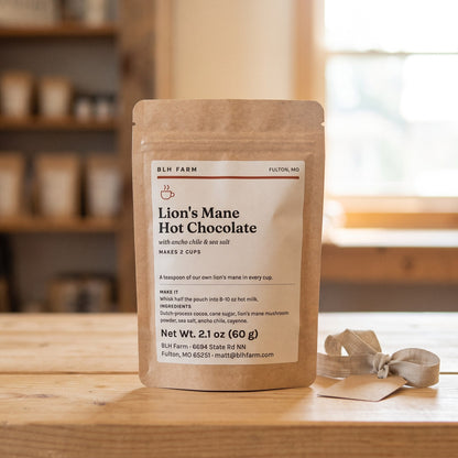 Lion's Mane Hot Chocolate 2-cup gift pouch with a ribbon tag