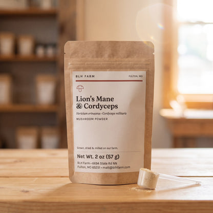 Lion's Mane & Cordyceps mushroom powder 2 oz pouch with a scoop