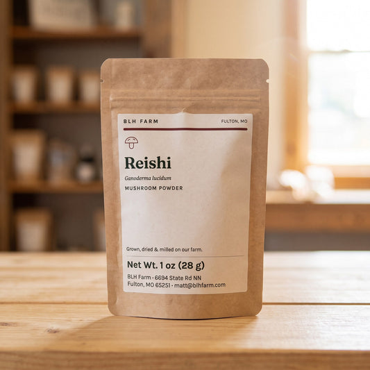 Reishi mushroom powder 1 oz kraft pouch on a wood counter