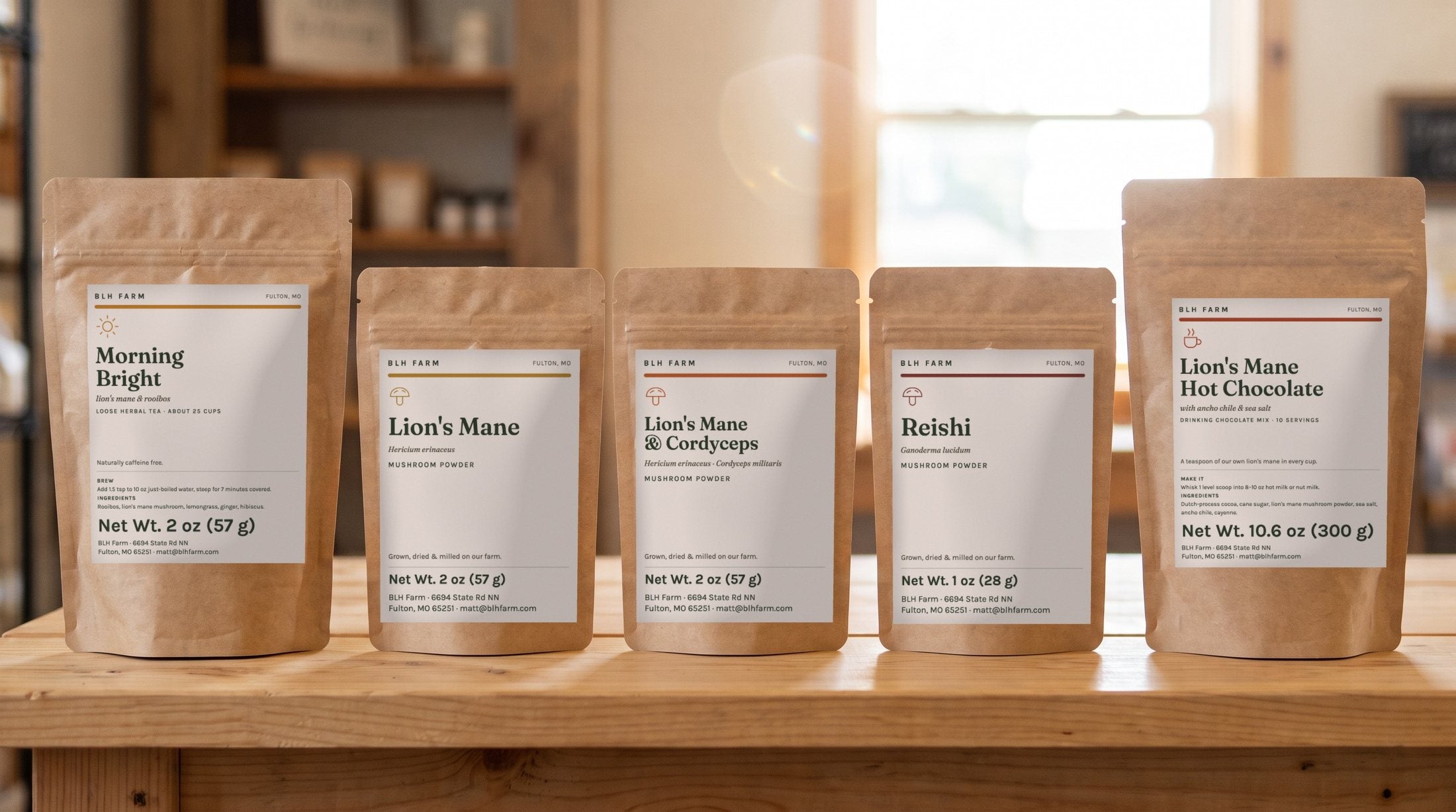 BLH Farm Morning Bright tea, Lion's Mane, Lion's Mane & Cordyceps and Reishi powders, and Lion's Mane Hot Chocolate in kraft pouches